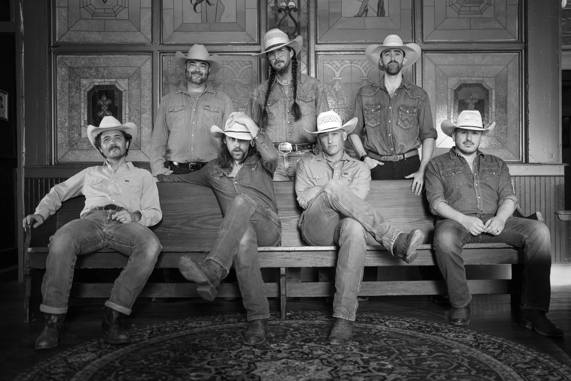 Black and white portrait of the band members of All Hat No Cadillac