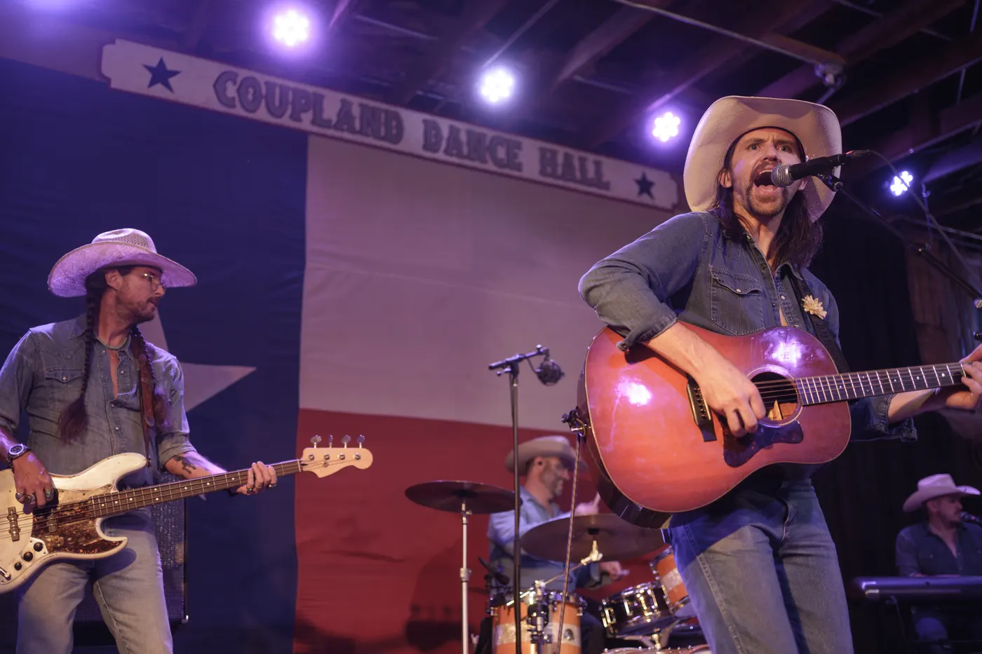 All Hat No Cadillac frontman singing live, available for events in Houston TX