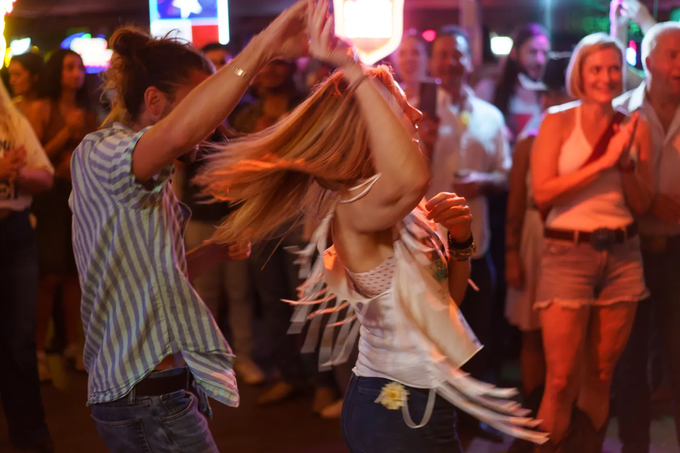 Dancers letting loose at an All Hat No Cadillac show